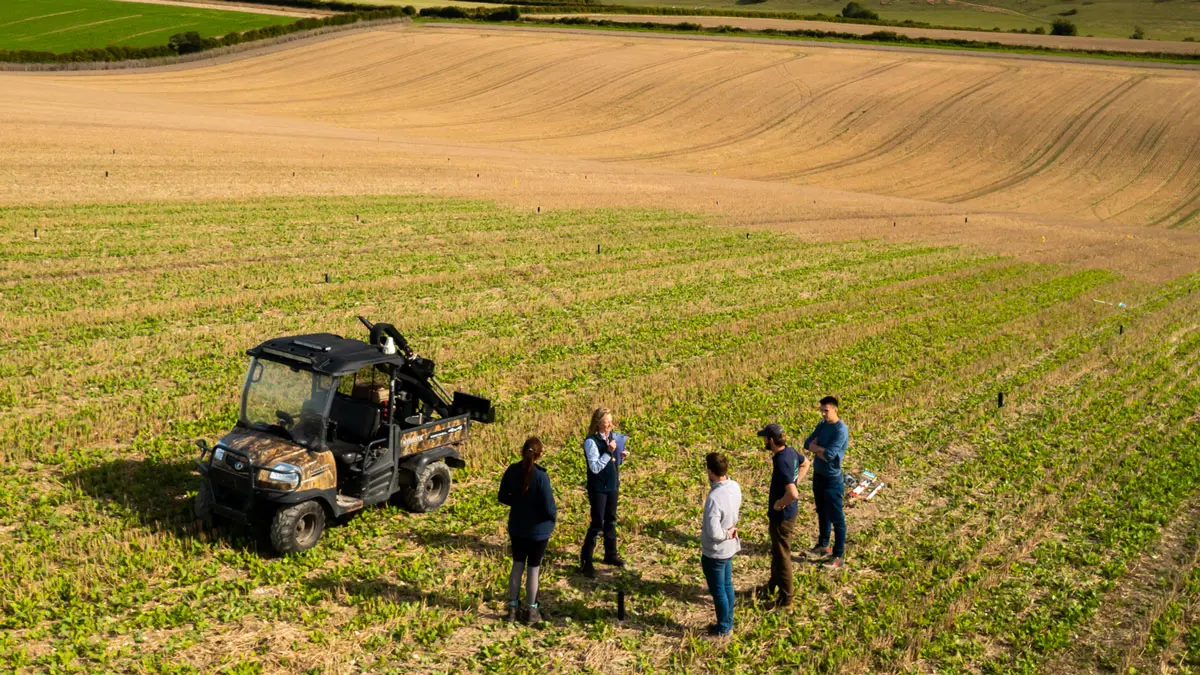 Catchment team stood on farmland talking