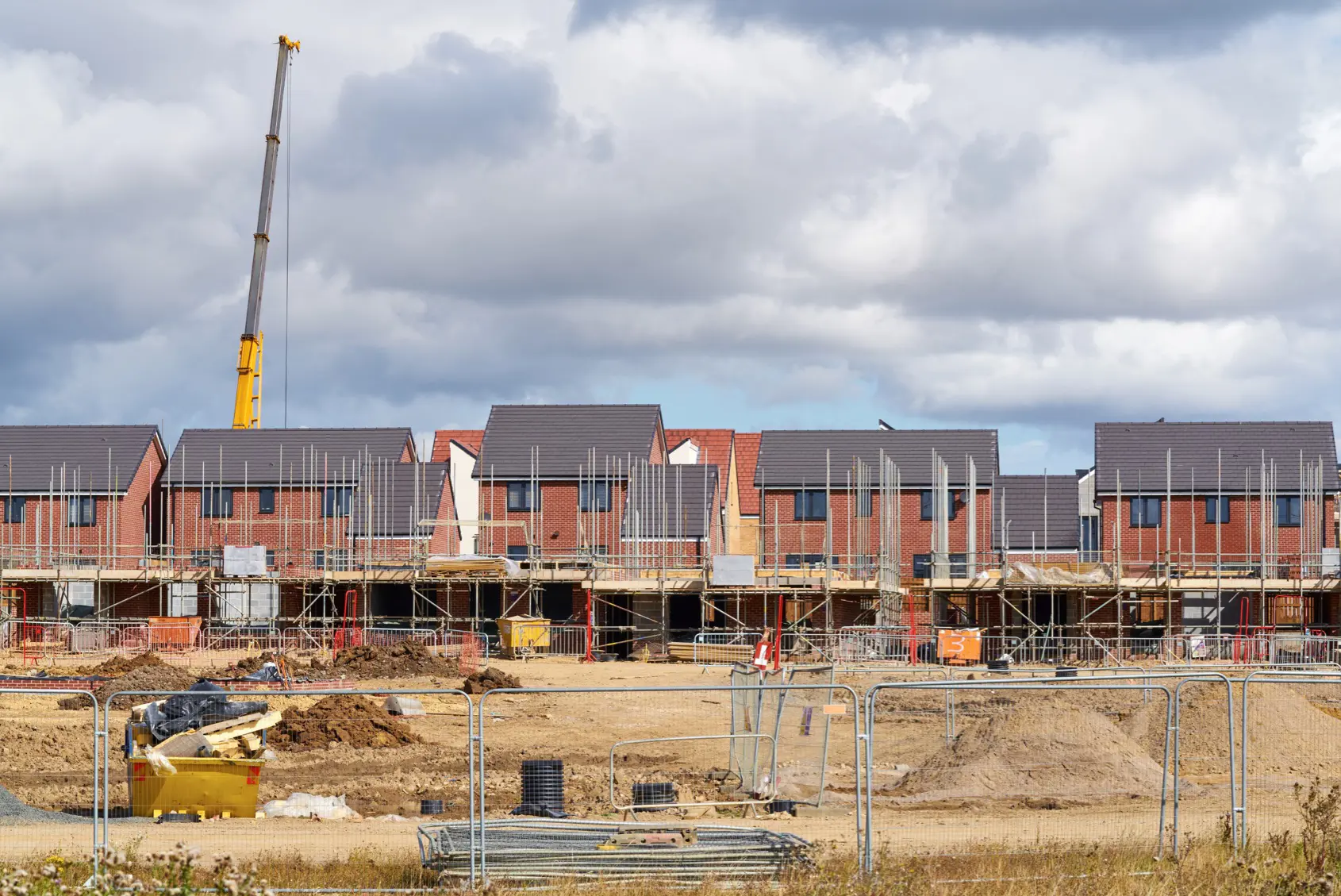 New houses under construction at development site