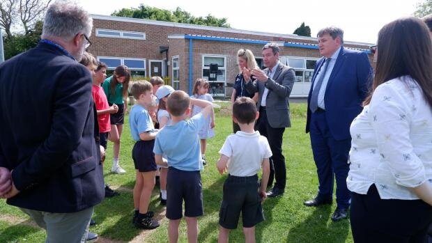 Lawrence Gosden with Kit Malthouse at the opening of the swale